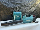 Makita Portable Power Supply PDC1200 With CBU01 Blower Shoulder Strap. Fixed Price $1550.00.