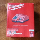 Milwaukee M18 M12 Power Tool Battery Charger Red 48-59-1812 Charges. Fixed Price $75.00.
