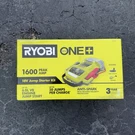 Ryobi One+ 18V Cordless 1600A Jump Starter With 2.0 Ah Battery And Charger P7110. Fixed Price $130.00.