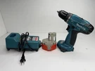 Makita 6281D Combi Cordless Drill With Charger And Battery .. Fixed Price $40.49.