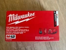 Milwaukee M12 Charger And Battery 50-59-2404 New. Fixed Price $50.00.