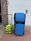 Slinger Tennis Machine/bag With Hopper + Balls. Fixed Price $650.00.