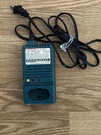 Makita DC9700A Battery Charger - Blue. Fixed Price $15.00.