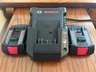Genuine Bosch BC660 Lithium Ion Battery Charger W/2 BAT609 18V Batteries. Fixed Price $49.99.