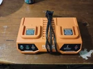 Ridgid AC86095 18V Battery Charger - Black/orange. Fixed Price $60.00.