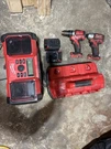 Milwaukee M18/M12 Rapid Charger + Brushless Drill/impact X2 5AH Batteries. Fixed Price $434.99.