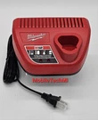 New Milwaukee M12 Oem Battery Charger Genuine 48-59-2401 Lithium-ion Volt. Fixed Price $15.98.