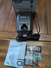 Ridgid R86045 12 Volt Compact Lithium-ion Battery Charger Genuine- New Open Box. Fixed Price $27.99.