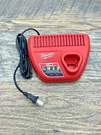 Milwaukee Tools M12 Volt Battery Charger Red Lithium-ion 48-59-2401. Fixed Price $14.95.