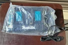 Makita DC18RD 18-VOLT Lithium-ion Dual Port 2.0AH 5.0AH Rapid Battery Charger. Fixed Price $77.77.