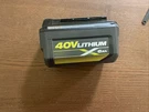 Ryobi OP40602 6AH Lithium-ion Battery And Charger. Fixed Price $130.00.