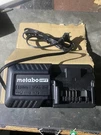 Metabo Hpt UC18YFSL 18V Li-ion Battery Charger Black. Fixed Price $30.00.