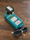 Makita DC1411 Battery Charger & 1233 12V 2.2AH - Tested Working. Fixed Price $38.59.