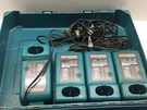 Lot Of 4X Makita DC1414T 7.2V - 14.4V Battery Chargers With Case 6217DWDE. Fixed Price $70.30.