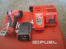 Milwaukee M18 Red 18V Starter Kit Impact Wrench, 2.0 Battery,and Rapid Charger. Fixed Price $165.00.