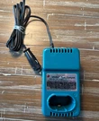Genuine Makita 7.2V Fast Battery Charger DC7012 Mobile 12V Car Lighter Plug. Fixed Price $14.50.