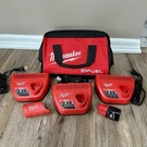 Genuine Milwaukee M12 1.5 Battery Heated Gear 43-72-1000 Chargers Bag Lot. Fixed Price $45.00.