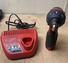 Milwaukee 2401-20 Screwdriver Charger And Battery Included. Fixed Price $59.99.