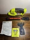 Ryobi One+ 18V Cordless Grass Shear And Shrubber Trimmer P2900BTL. Fixed Price $55.00.