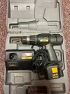 Ryobi 12V 3/8 Drill, Charger, Battery And Case Model CTH1202K2. Fixed Price $19.99.