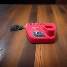 Milwaukee M12 48-59-2401 Li-on Lithium Battery Charger 12V New. Fixed Price $12.99.