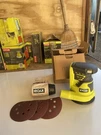 Original Ryobi P411 One+ 18V 5" Cordless Random Orbit Sander W/accessories #117. Fixed Price $50.00.