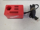 Milwaukee Tool 2.4 Volt Class Battery Charger Cat 48-59-0300. Fixed Price $39.95.
